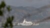 Sebuah kapal Garda Pantai China dekat Kepulauan Matsu yang dikuasai Taiwan yang dekat dengan pantai China,, 8 April 2023. (Foto: REUTERS/Thomas Peter)