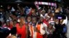 Supporters of Ghanaian presidential candidate Nana Akufo-Addo of the opposition New Patriotic Party (NPP) celebrate after he announced that he won the presidential election during a press conference at his private home in Accra, Ghana Dec. 8, 2016. 