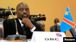 FILE - DRC President Joseph Kabila is seen at a summit in Uganda's capital, Kampala.