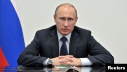 Meski mendapat desakan Washington, Presiden Rusia Vladimir Putin mengatakan Edward Snowden tidak akan diekstradisi ke Amerika (foto: dok). 