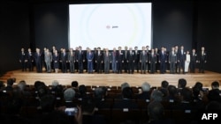 The founder of Taiwan's chip giant Taiwan Semiconductor Manufacturing Company, Morris Chang, center, attends the opening ceremony for the new semiconductor plant by subsidiary Japan Advanced Semiconductor Manufacturing Company, in Kikuyo, Japan, on Feb. 24, 2024.