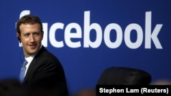 FILE - Facebook CEO and founder Mark Zuckerberg, shown in 2015, dismisses the notion that fake news stories on the social media network swayed U.S. election results.