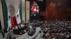 Mexico's President Claudia Sheinbaum speaks during her swearing-in ceremony at the Congress, in Mexico City, Mexico, Oct. 1, 2024. King Felipe VI of Spain was not invited to the event due, in part, to a dispute over Spain's 16th century defeat of Mexico's powerful Aztec rulers.