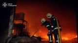 FILE - Firefighters work at the site of a warehouse hit by a Russian drone strike, amid Russia's attack on Ukraine, in Sumy, Ukraine, March 6, 2025. (Press service of the State Emergency Service of Ukraine in Sumy region/Handout via Reuters)