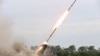 North Korea's Kim attends test-firing of rocket launcher