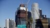 FILE - The new Metropolis project, which is being built by Chinese developer Greenland, is seen in downtown Los Angeles from the 110 freeway in Los Angeles, California, United States, Nov. 12, 2015. 