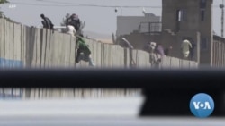 Biden Seeks to Weather Afghan Withdrawal Storm