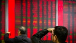 中國政府要求退休金和共同基金增加對國內股票的投資，幫助低迷的A股市場擺脫困境，試圖透過確保股價上漲。 (美聯社：2018年10月31日)