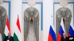 Primeiro-Ministro húngaro, Viktor Orban, e o Presidente russo, Vladimir Putin