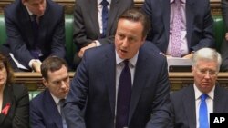 PM Inggris David Cameron saat menyampaikan pidato di hadapan anggota parlemen Inggris di London (2/12). 
