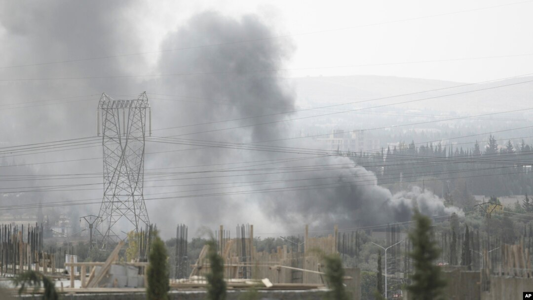 Smoke rises in the countryside of Damascus, Syria, on Oct. 30, 2021, following what Syrian state media said was an Israeli airstrike.