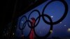 The Beijing Olympic Tower is displayed inside the Olympic rings at the main media center, Jan. 31, 2022.