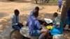 A 20% salary increase and some incentives announced by Zimbabwe's government Tuesday night did not change the teachers’ minds. As a result, students in Chitungwiza, Zimbabwe, on Feb. 10, 2022, read on their own (Columbus Mavhunga/VOA) 