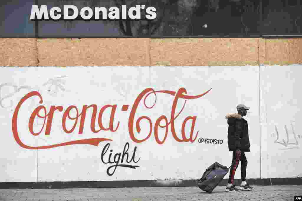 &ldquo;McDonald&#39;s&rdquo; restorani tashqarisida devorga tushirilgan surat. Fransiya, 17-mart, 2020-yil. &nbsp;