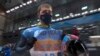 Winter Olympians Champion Climate, Peace Amid Muted Activism
