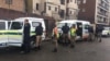 Amapholisa akwele South Africa ngesikhathi abaqhuba umkhankaso weOperation Dudula betshengisela emigwaqweni eJohannesburg,