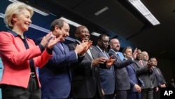 From left, European Commission President, Egyptian, South African, Senegalese Presidents, European Council President, French President and WHO Director General.