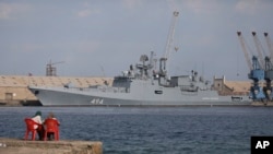 FILE - A Russian warship is docked in the Port Sudan, in Port Sudan, Sudan, Feb. 28, 2021.