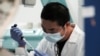 FILE - Chinese graduate students who study STEM fields often stay and work in the United States after graduation.