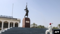 Kenya and Somalia have agreed to try to reduce diplomatic tensions at a conference this week in Djibouti. A firefighter sprays the area in front of the People's Palace, a public ceremony hall, in Djibouti, on May 14, 2020.