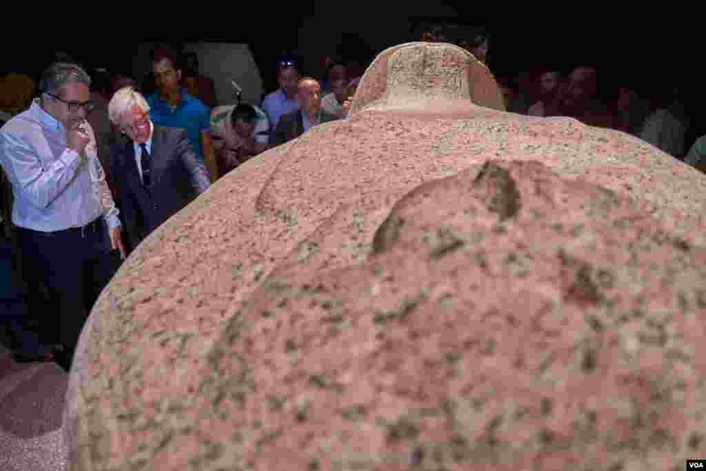 Egypt’s Minister of Antiquities, Khaled Al-Anani, gazes at the Tausert Sarcophagus, on display for the first time since its discovery. (Photo: H. Elrasam)