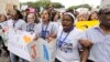 FILE - Demonstrators in downtown Houston during a March for Our Lives protest for gun legislation and school safety, March 24, 2018. 