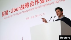 CEO Uber Travis Kalanick berbicara dalam acara penandatanganan kerjasama dan investasi strategis antara Baidu dan Uber di markas besar Baidu di Beijing, 17 Desember 2014.