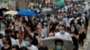 香港民众2019年10月11日集会游行抗议警方涉嫌虐待被捕抗议人士。
