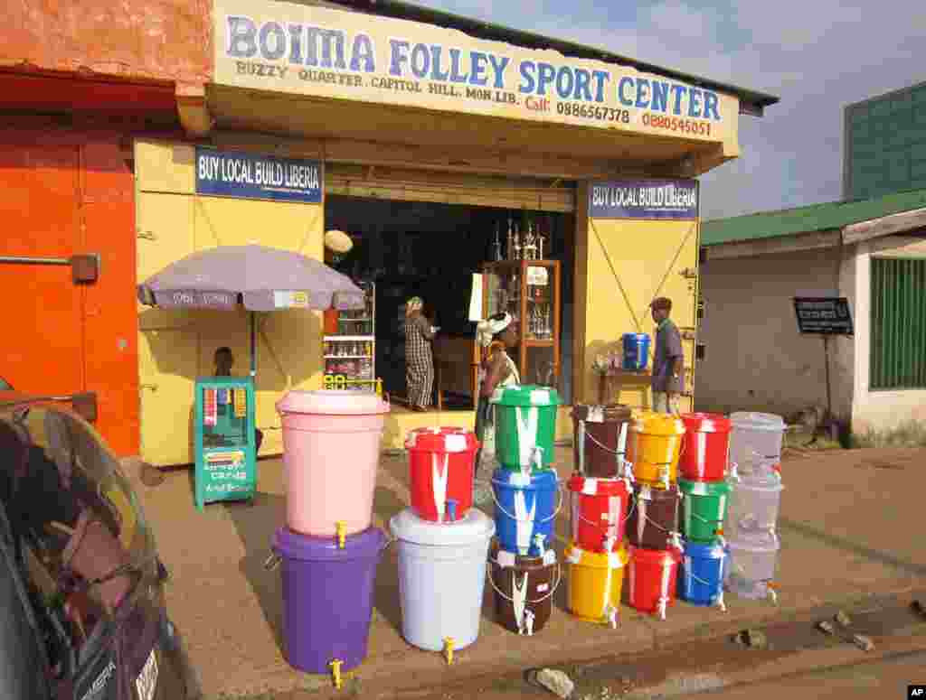 According to local reports, the sale of water buckets has increased dramatically because they are used by Liberians to wash their hands with disinfectant to prevent the spread of the deadly Ebola virus, Monrovia, Liberia, Aug. 4, 2014.