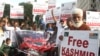 Pakistani protesters rally against India in Karachi, Pakistan, Aug. 21, 2019.