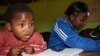 Sisa, who suffers from schizophrenia, does not participate in most activities with other children. (VOA/ D. Taylor) 