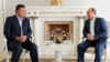 FILE - Russian President Vladimir Putin (R) is seen at a meeting with Ukrainian President Viktor Yanukovych.