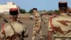 General Grégoire de Saint-Quentin, force commander of Operation Serval, reviews troops in Bamako, Mali, July 14, 2013. (I. Broadhead/VOA) 