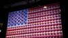 The Super Bowl is the most-watched American sporting event of the year. This American flag has been decorated with Wilson footballs, the company that manufactures every football that is used by the NFL. (B. Allen/VOA)