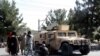 Taliban fighters guard outside the airport in Kabul, Afghanistan, Aug. 27, 2021, a day after a deadly attack.