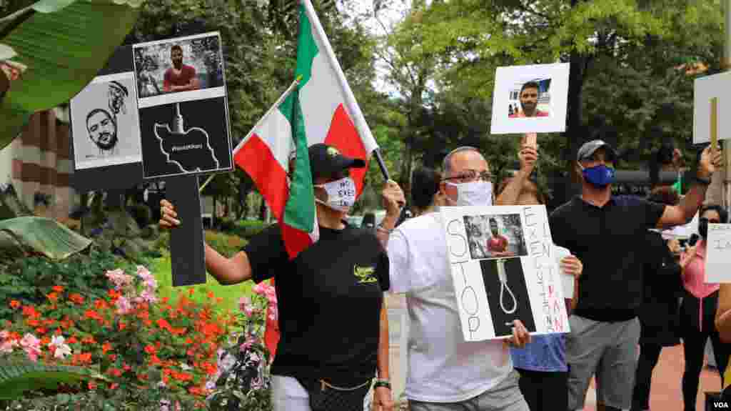 تجمع اعتراض به اعدام نوید افکاری مقابل دفتر حفاظت از منافع جمهوری اسلامی در واشنگتن - این تجمع در حالی برگزار شد که پیشتر وزیر خارجه آمریکا اعدام نوید افکاری را « یک اقدام خبیثانه و ظالمانه» نامیده بود.