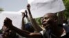 School teachers take part in a rally to call for the release of abducted schoolgirls held by Boko Haram and to demand better security, in Maiduguri, Nigeria, May 22, 2014.