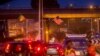 An Ethiopia national flag, left, is seen next to a U.S. flag, center, in a busy street ahead of U.S. President Barack Obama's visit to Addis Ababa, Ethiopia, Saturday, July 25, 2015.