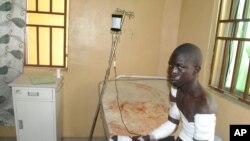 A victim of a Boko Haram attack receives treatment at a hospital, in Maiduguri, Nigeria, Dec. 28, 2015. 