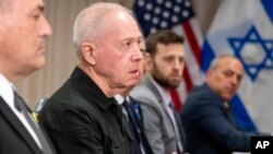 Israeli Defense Minister Yoav Gallant, second from left, meets with Defense Secretary Lloyd Austin at the Pentagon, March 26, 2024, in Washington.