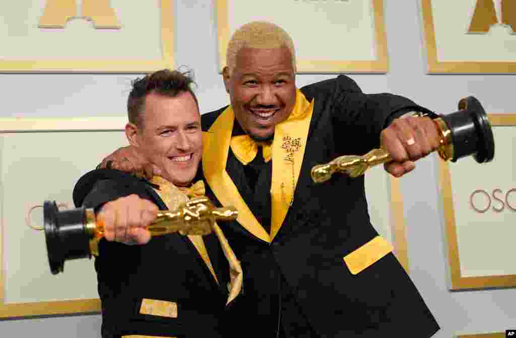 Martin Desmond Roe, left, and Travon Free pose with award for best live action short film for "Two Distant Strangers" in the press room at the Oscars on Sunday, April 25, 2021, at Union Station in Los Angeles. (AP Photo/Chris Pizzello, Pool)