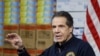 New York Gov. Andrew Cuomo speaks during a news conference against a backdrop of medical supplies at the Jacob Javits Center that will house a temporary hospital in response to the COVID-19 outbreak, March 24, 2020, in New York. 
