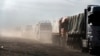 Aid trucks enter Gaza, as officials hope ceasefire holds