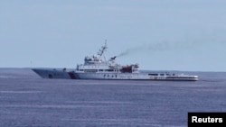 FILE - Chinese patrol ship Haixun 01 is pictured during a search for Flight MH370, in the south Indian Ocean, Apr. 5, 2014. (CNS photo) 