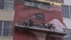 Los Angeles artist Robert Vargas says he's fulfilling his destiny by painting a huge mural in his hometown. (A. Martinez/VOA)