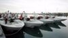 Screengrab from video showing Iranian speed boats during a March 2016 ceremony.