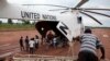 FILE - A World Food Program (WFP) truck backs up to load food items from a recently landed UN helicopter, in Yida camp, South Sudan. Ban's visit comes as implementation of the peace agreement signed last August between President Salva Kiir and his former vice president, Riek Machar, is proceeding only slowly. 