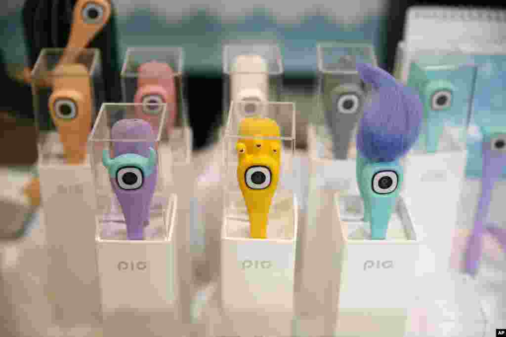 PIG cameras are on display at CES Unveiled, a media preview event for CES International, Monday, Jan. 4, 2016, in Las Vegas. The device has a flexible body and video camera in the head.