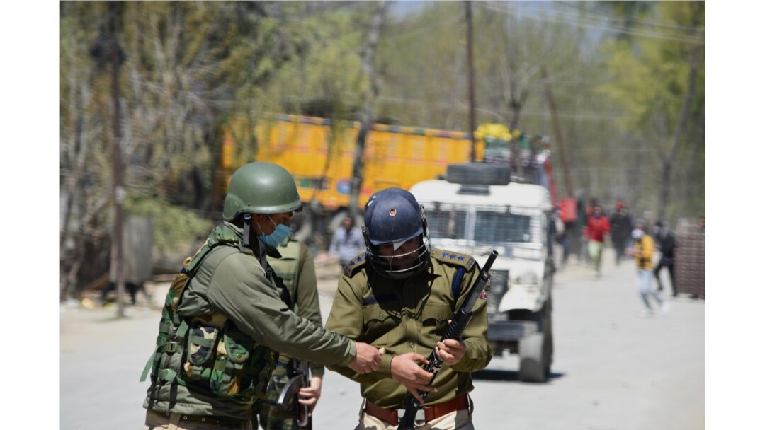 Police are seen in India-controlled Kashmir, in this undated photo by photojournalist Qisar Mir.