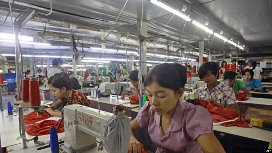 Myanmar laborers work in a garment factory on the outskirts of Yangon.